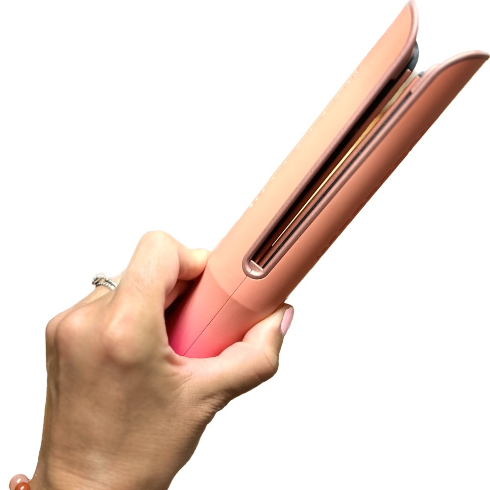 Calista AirGlide Multi-Tasking Cool Breeze Styler in Peach Mai Tai color.
